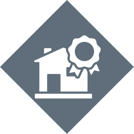 House with ribbon icon on diamond background.